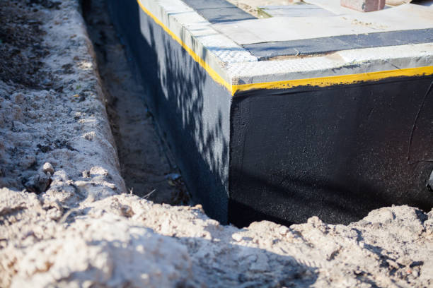 Professional Waterproofing technician working in Greenville, NY